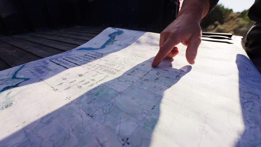 land agent reviewing map